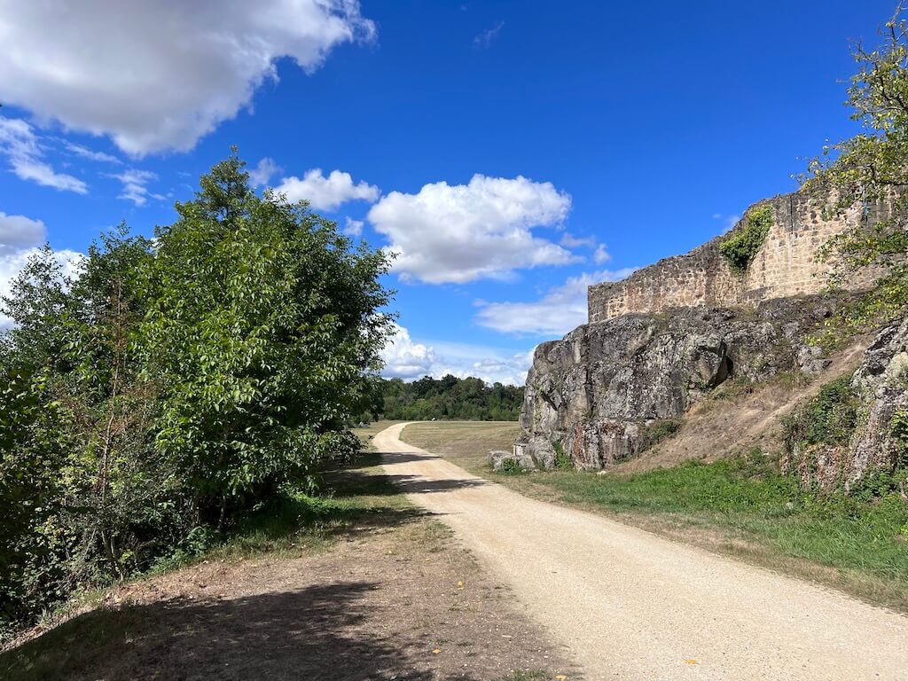 Walk along below the fortifications, along the river Trout